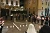 Un gruppo di persone raccolte in preghiera in una piazza di Lugano in occasione della Veglia di solidarietà. csi